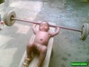 Baby Lifts Up Heavy Weight.JPG