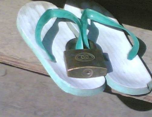 Slippers under security.jpg